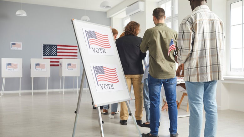 A group of people lined up to vote