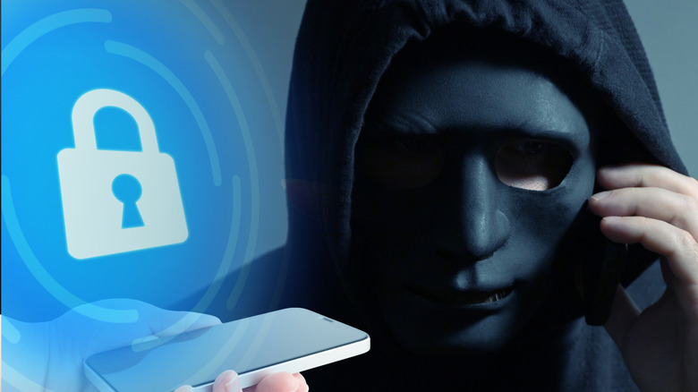 A composite image of a security icon floating over a hacked phone, with a hooded and masked scammer on the right side of frame on their own phone