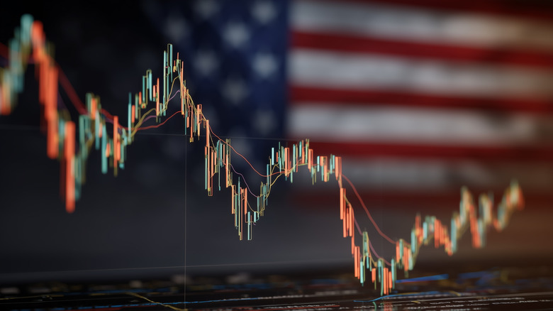 blurred out stock asset chart with united states flag in the background