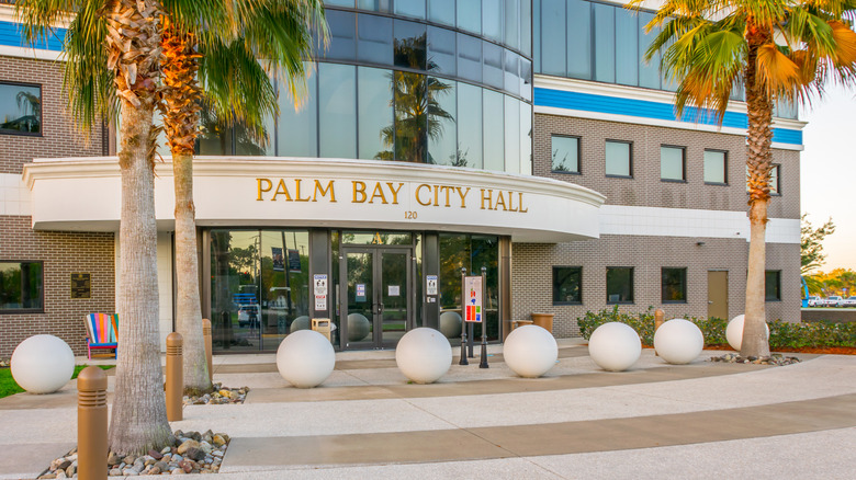 The sun setting on City Hall in Palm Bay, Florida