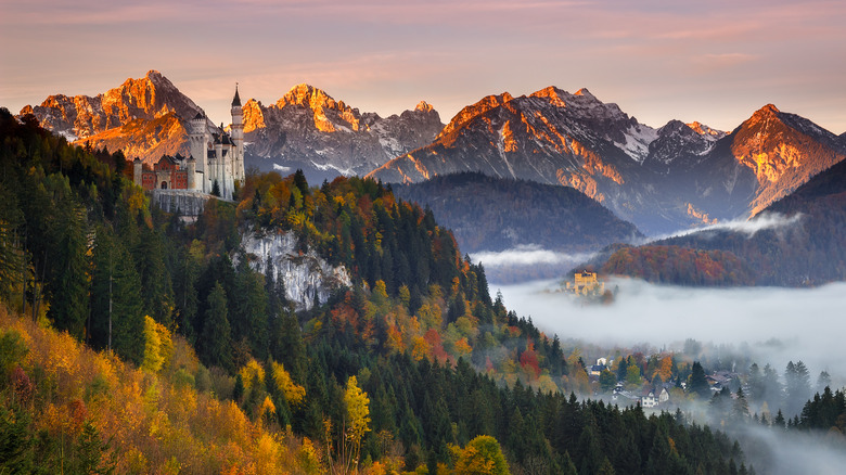Mountain view of Neuschwanstein castle at sunrise