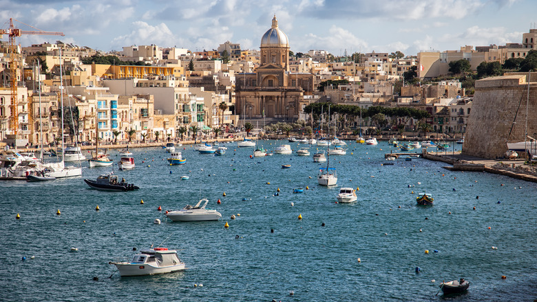 Sailing boats on Senglea marina in Grand Bay, Valetta, Malta