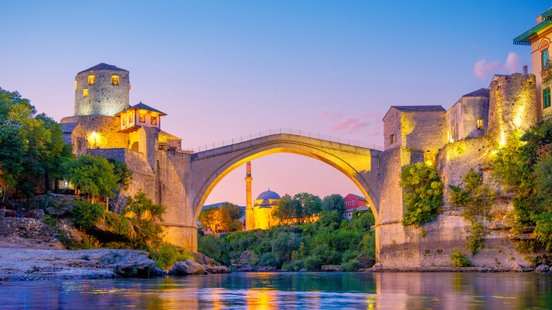 The Mostar bridge lit up at night in Bosnia and Herzegovina.
