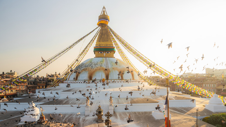 Scenic view of Buddha stupa in Kathmandu, Nepal at sunset