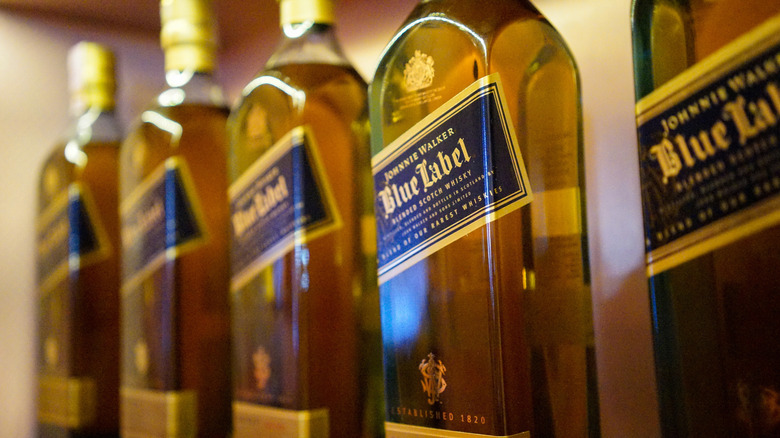 Row of Johnnie Walker Blue Label bottles