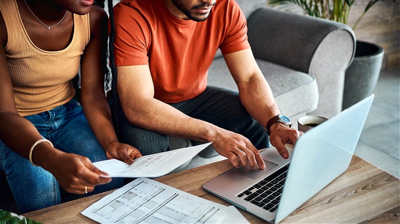 Couple working on taxes together