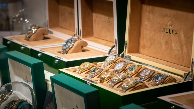 Several Rolex watches on display in a store