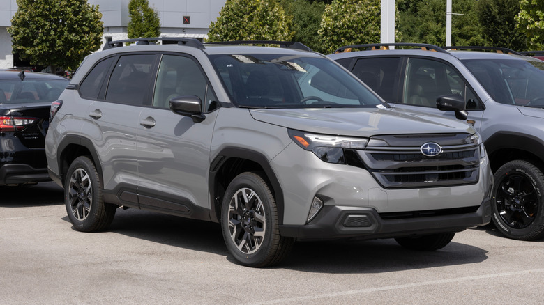 A Subaru Forester Premium Compact SUV at a dealership.