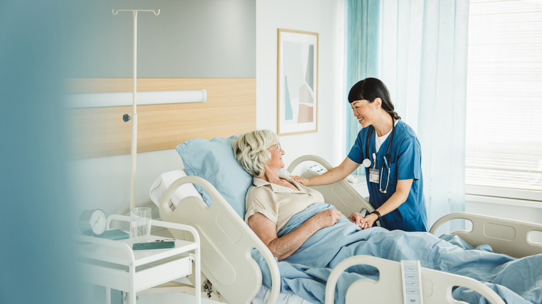 senior patient in hospital bed