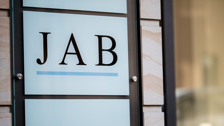 A 'JAB' logo sign is seen at the office building