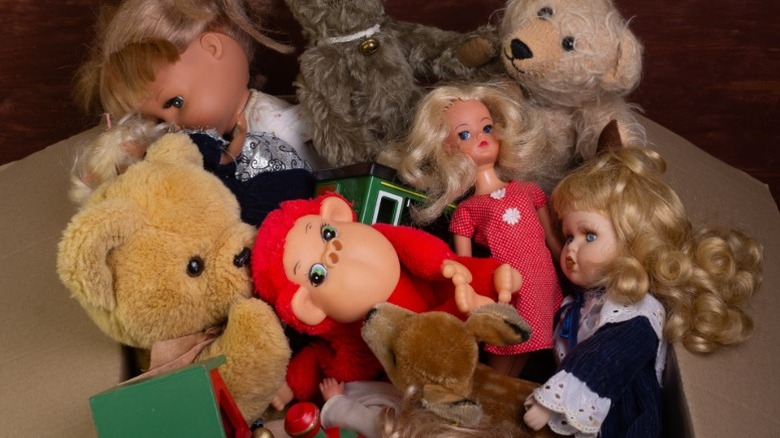 A box of old toys that could be worth a lot if sold.