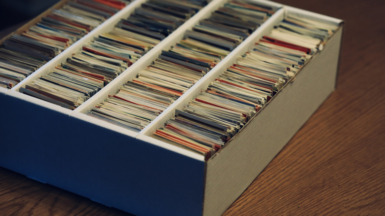 An organized box of sports cards.