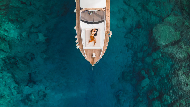 overhead shot of couple on a boat
