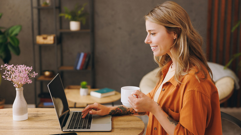 A woman working on her laptop