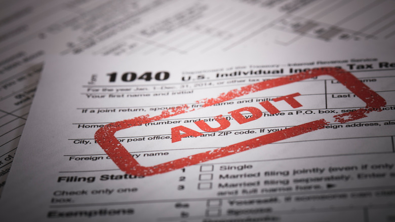 1040 form with audit stamped over it