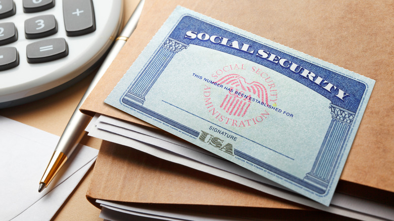 Social Security card laying on a desk