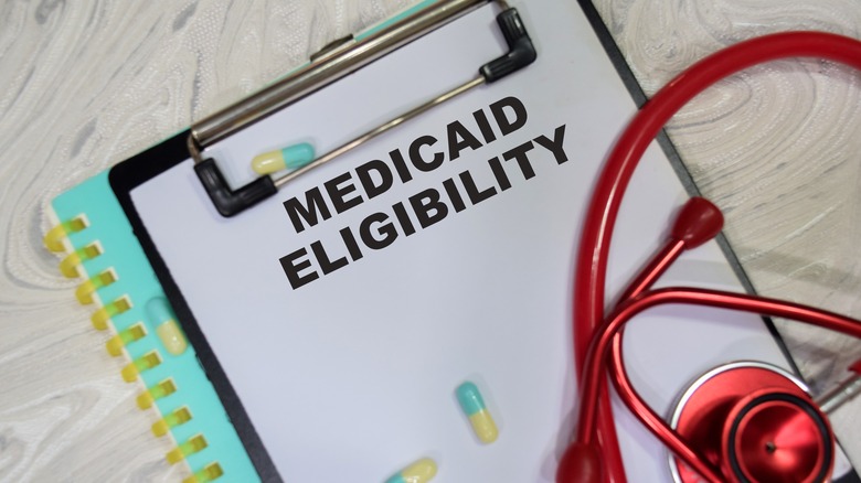 White paper that says Medicaid eligibility under a stethoscope