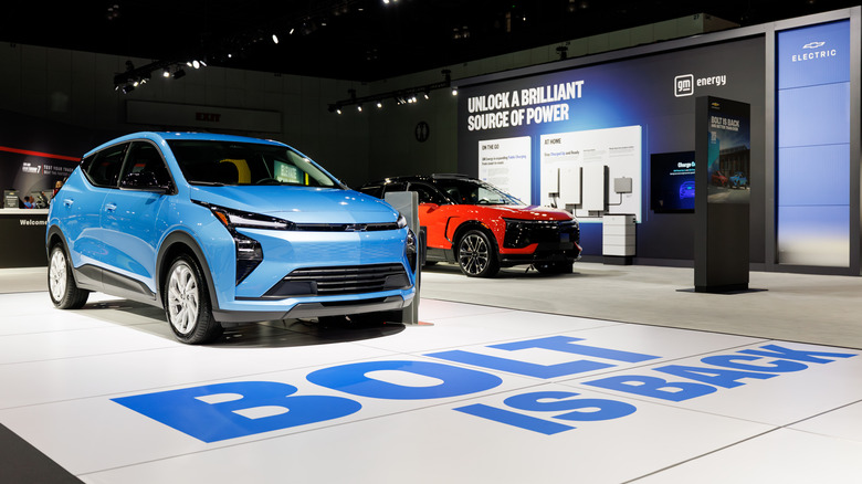 A Chevrolet Bolt parked on a display room floor.