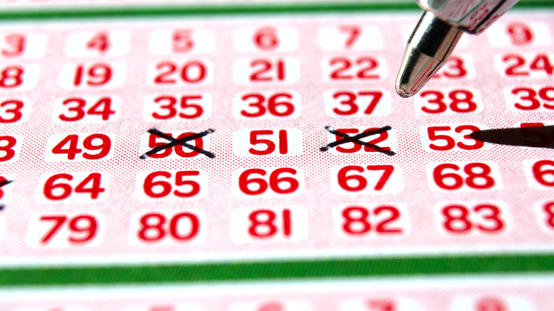 closeup of lottery player picking numbers