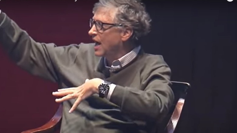 Bill Gates, wearing a Casio Duro Marlin watch, speaks at Harvard University in April 2018.