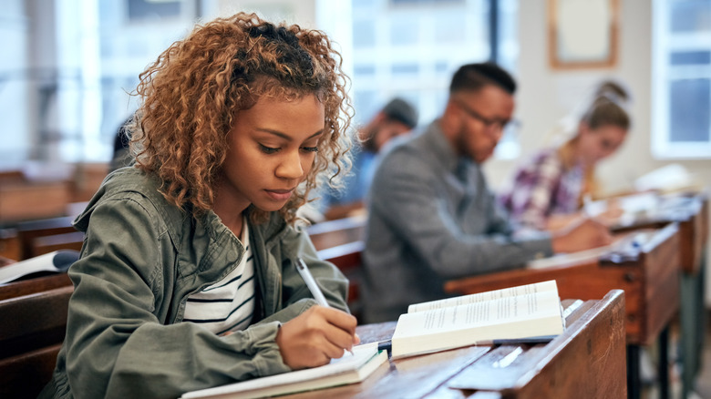 Cropped shot of university students sitting in class
