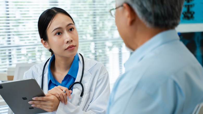 doctor discussing test results with an older patient