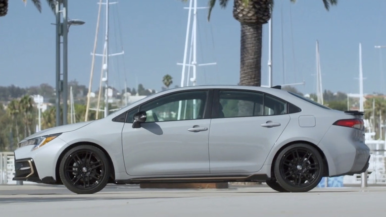 A gray 2022 Toyota Corolla parked in front of a hardbor