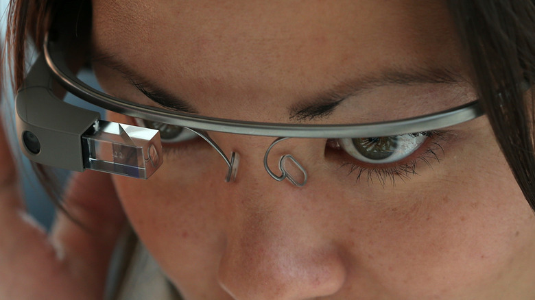 An attendee tries Google Glass during the Google I/O developer conference wearing the Google Glass.