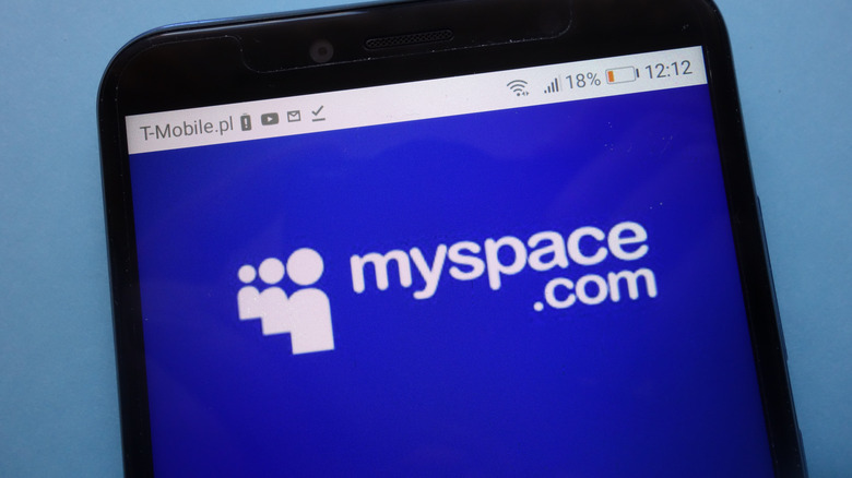 The MySpace logo on a phone.