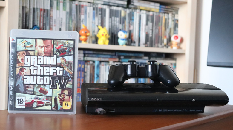 A PlayStation 3 and controller displayed next to "Grand Theft Auto IV"