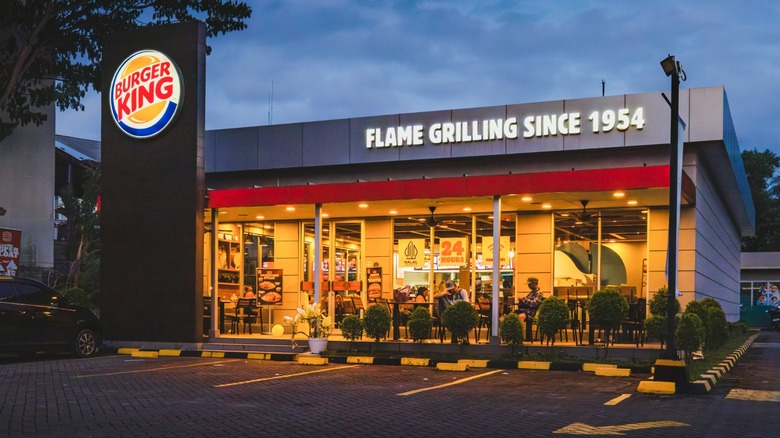 A Burger King location in the evening