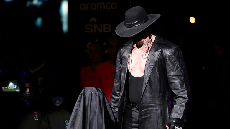 The Undertaker wrestler under a spotlight