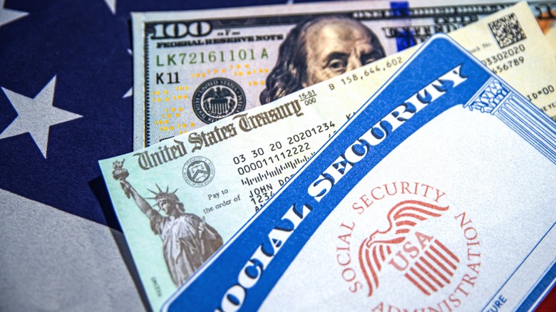 Pic an American $100 bill, a United States Treasury check, and a Social Security card