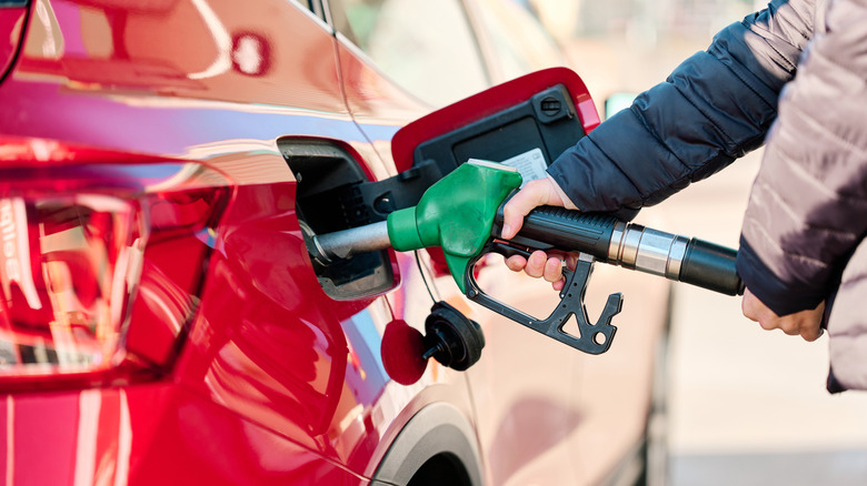 filling up car with gasoline