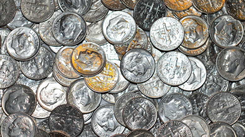 A pile of old silver dimes
