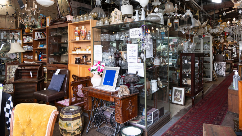 a selection of antique objects in a store