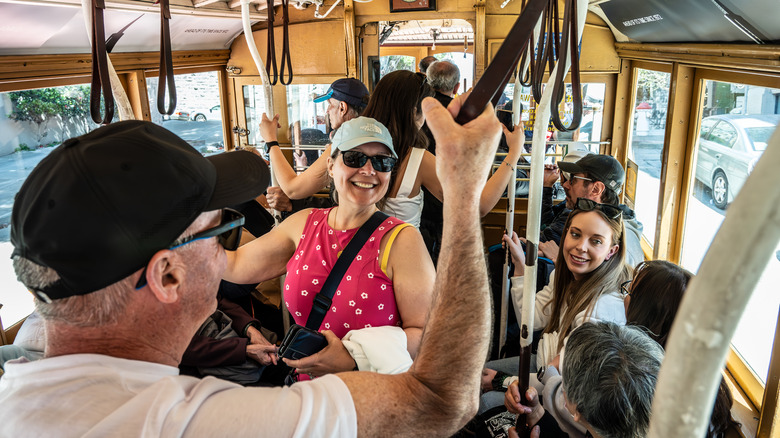 Passengers inside a San Francisco trolley car