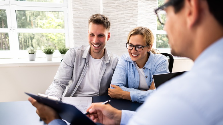 Couple working with a financial advisor