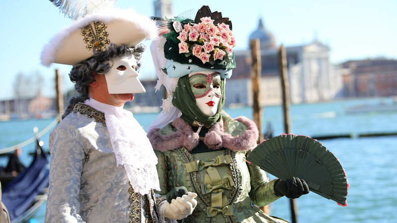 Masked couple at Carnevale in Venice Italy