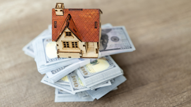 house figure on $100 bills