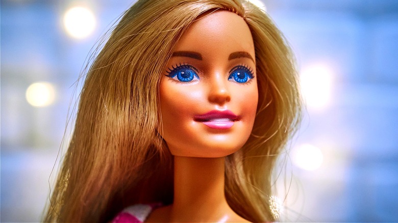 Barbie smiling blue background