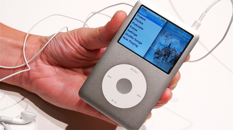 Hand holding Apple iPod Classic