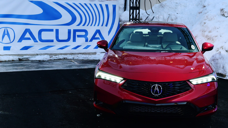A red 2023 Acura MDX