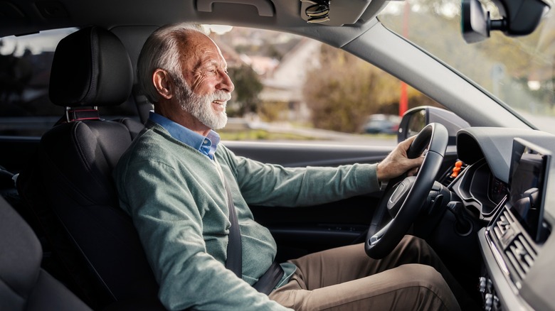 Senior driver behind the wheel of a car