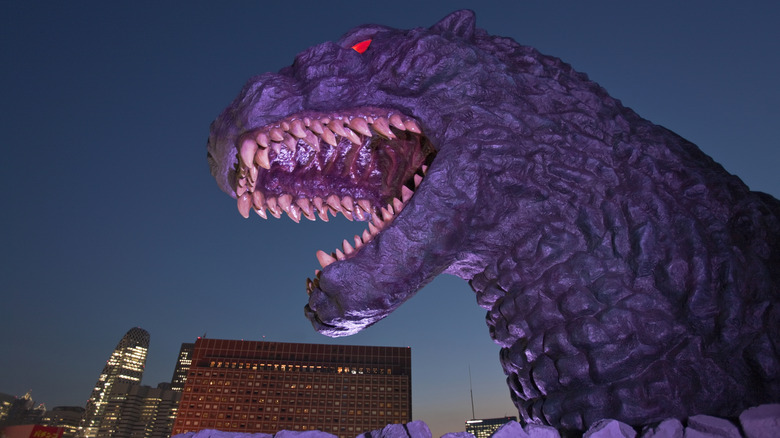 Life-sized Godzilla figure outside a Japanese movie theater