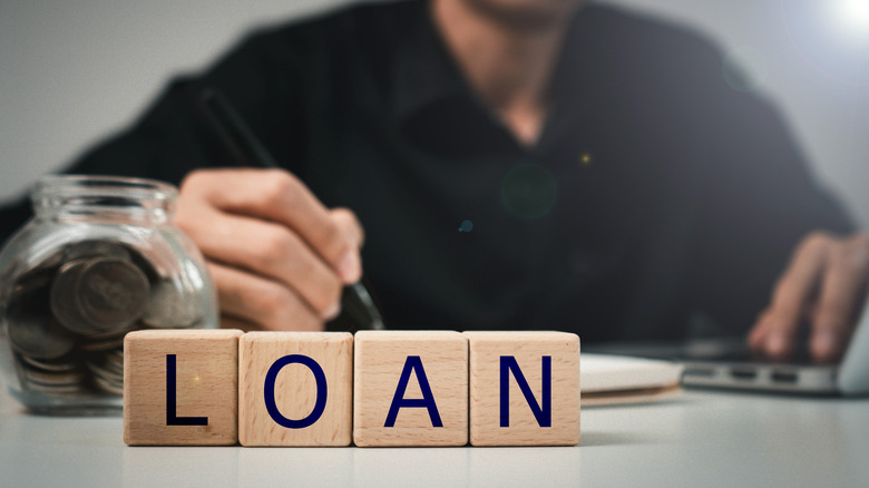 loan spelled in blocks