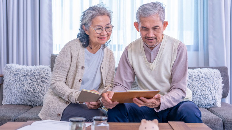 A senior couple determining a budget together