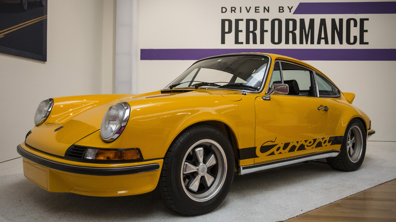 a yellow 1973 Porsche 911 Carrera RS 2.7