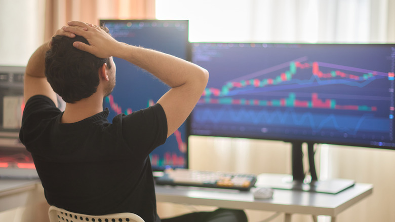 Person losing on investments.