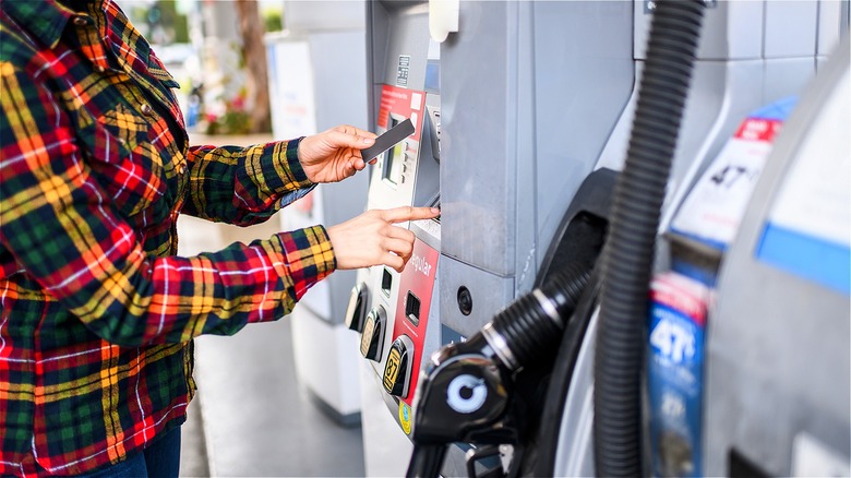 Person paying for gas